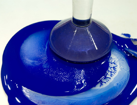 blue pigment being ground